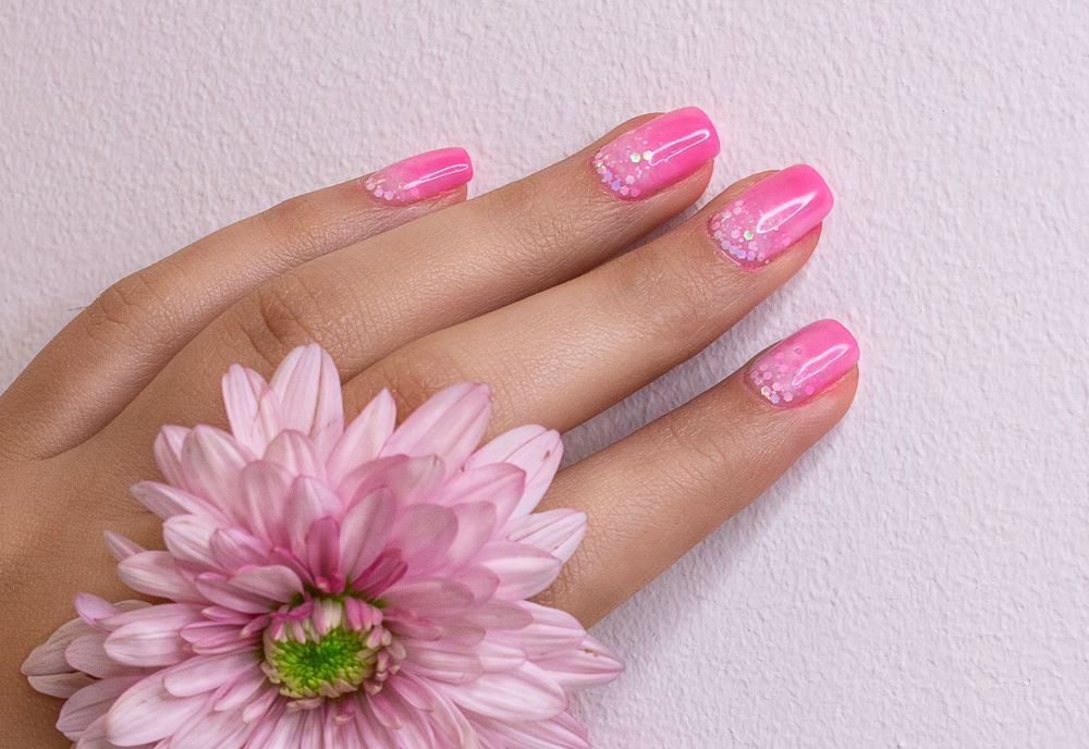 Pink manicure with flower